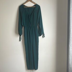 This beautiful green jumpsuit from Zara is brand new. Wore once.